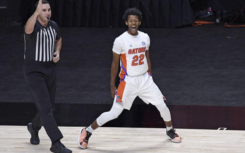 Florida's Tyree Appleby celebrates his basket putting Florida ahead for the first time in Wednesday's game against Army in Uncasville, Conn. (JESSICA HILL/Associated Press)