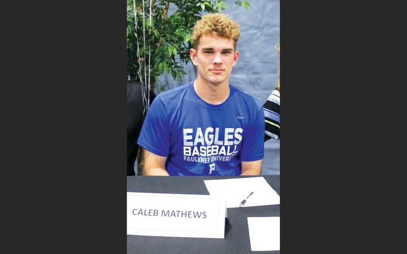 Fort White catcher Caleb Mathews signed with Faulkner on May 11. (FILE)
