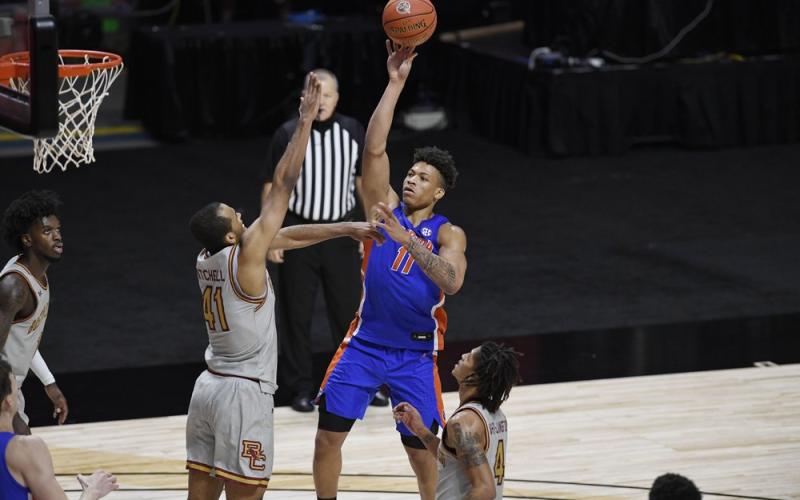 Florida's Keyontae Johnson shoots over Boston College's Steffon Mitchell (41) on Thursday in Uncasville, Conn. (JESSICA HILL/Associated Press)