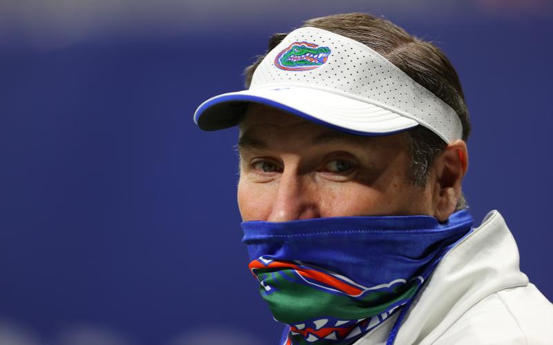 Florida Gators head coach Dan Mullen walks on the field during pregame warmups prior to facing the Alabama Crimson Tide in the SEC championship game at Mercedes-Benz Stadium on Dec. 19 in Atlanta, Ga. (KEVIN C. COX/Getty Images/TNS)