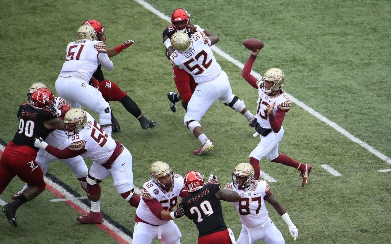 Florida State Seminoles quarterback Jordan Travis (13) passes the ball against the Louisville Cardinals at Cardinal Stadium on Oct. 24 in Louisville, Kentucky. (ANDY LYONS/Getty Images/TNS)