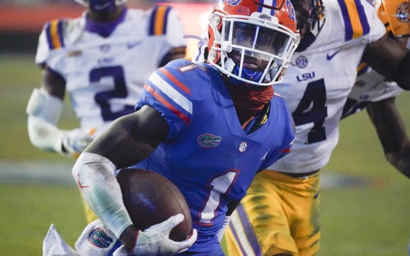 Florida wide receiver Kadarius Toney (1) scores a touchdown against LSU on Saturday in Gainesville. (JOHN RAOUX/Associated Press)