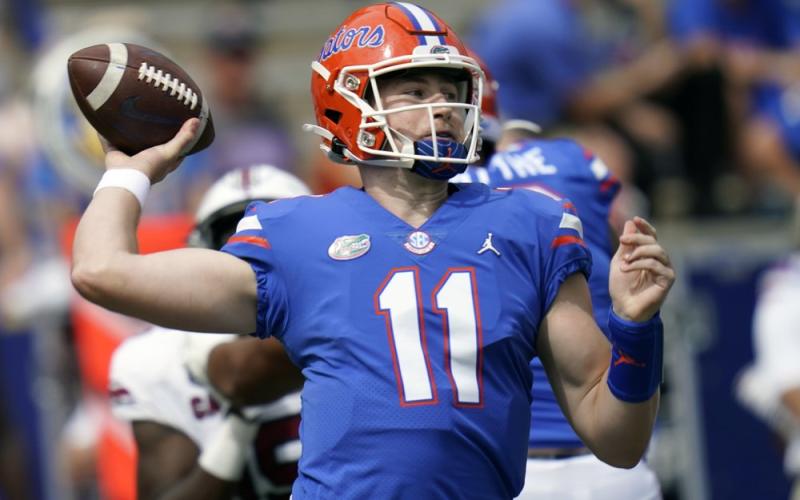 Florida quarterback Kyle Trask (11) throws a pass against South Carolina on Oct. 3 in Gainesville. (AP FILE PHOTO)