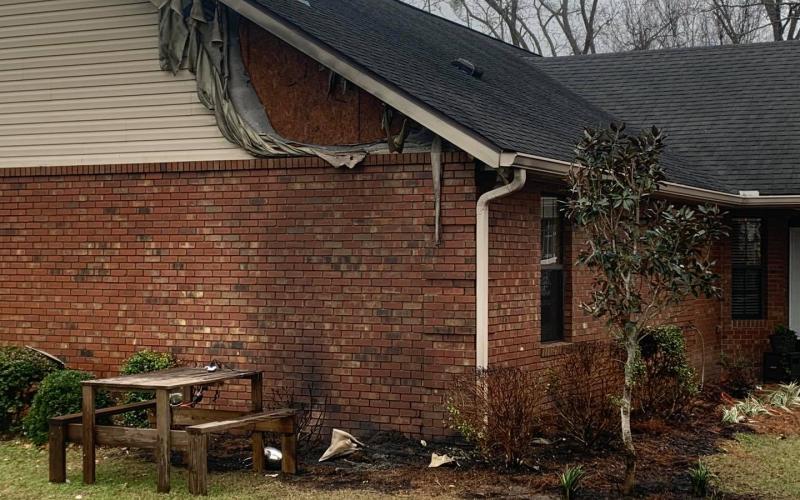 A home off 152nd Street in western Suwannee County sustained minor damage Wednesday after a heat lamp sparked a fire outside the house. (COURTESY SUWANNEE FIRE RESCUE)