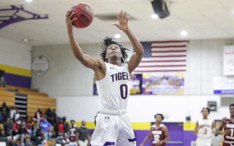 Columbia guard Dante Brown goes up for a shot against Madison County on Jan. 14. (BRENT KUYKENDALL/Lake City Reporter)