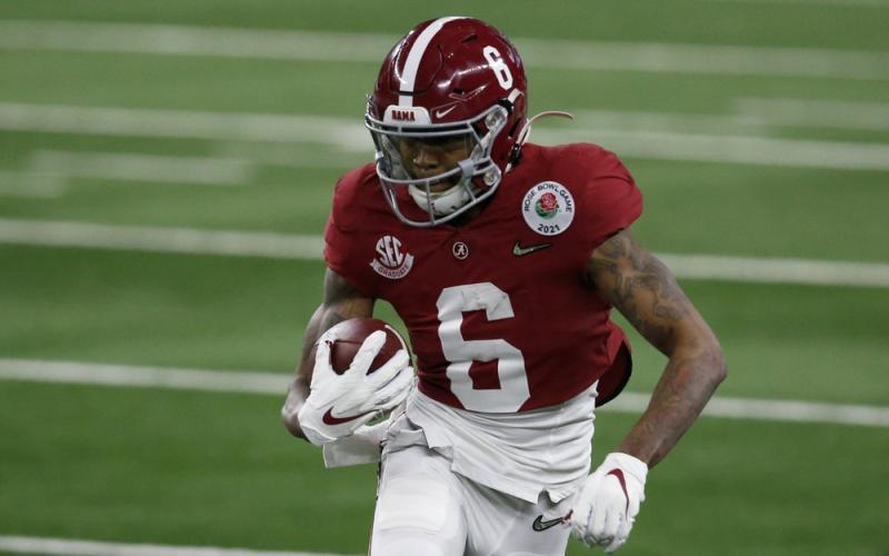 Alabama wide receiver DeVonta Smith (6) gains yardage after a catch in the first half of the Rose Bowl against Notre Dame on Jan. 1 Arlington, Texas. (ROGER STEINMAN/Associated Press)