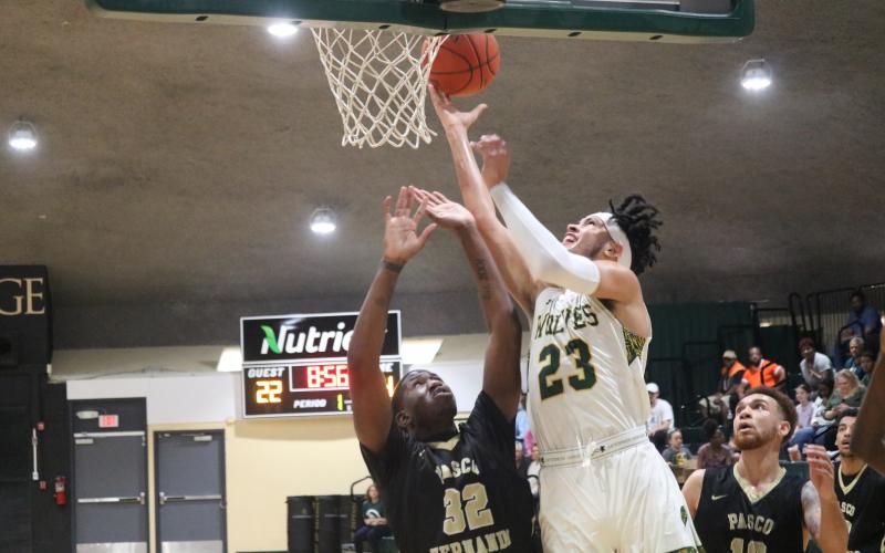 Florida Gateway College forward Brandon Farmer rises to score against Pasco-Hernando State College during last season’s Division II Region 8 Championship. (JORDAN KROEGER/Lake City Reporter)