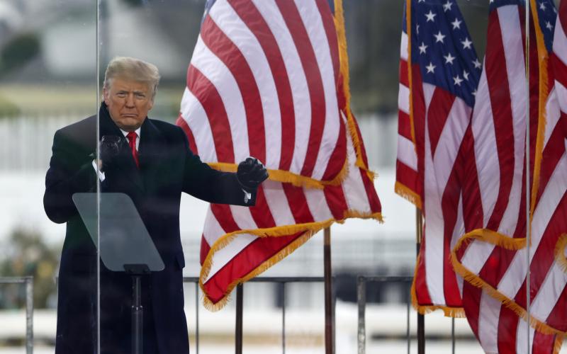 President Donald Trump greets the crowd at rally on Wednesday in Washington, D.C., before his supporters stormed the U.S. Capitol. (TASOS KATOPODIS/Getty Images/TNS)