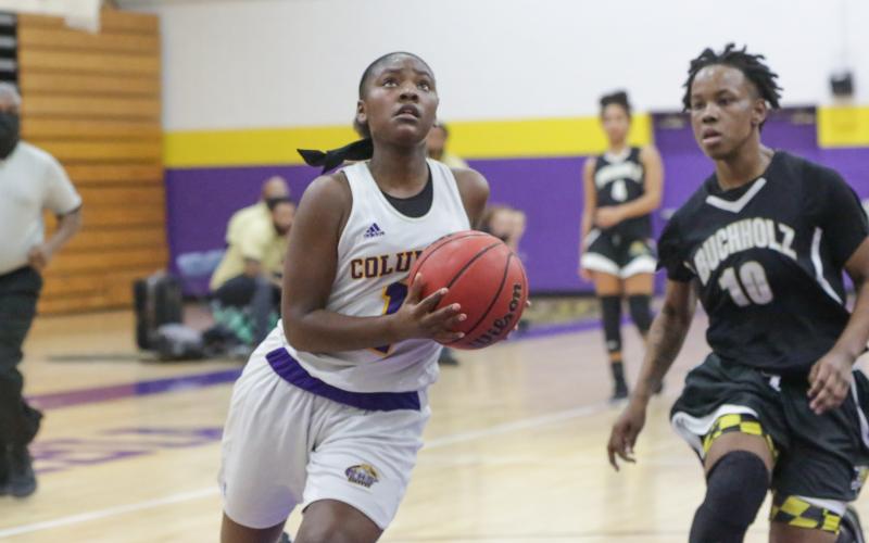 Columbia guard Anzarria Jerkins goes up for a shot against Buchholz during the District 2-6A championship game on Feb. 5. (BRENT KUYKENDALL/Lake City Reporter)