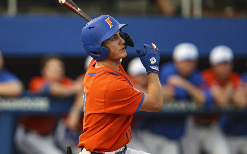 Florida outfielder Jud Fabian bats during a against Florida A&amp;M last season in Gainesville. The Gators are in a familiar place as the consensus No. 1 team in the preseason. Fabian might be the best position player in the country. (AP FILE PHOTO)