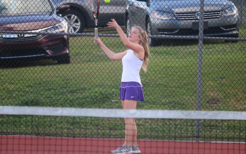 Columbia’s McKenna Thomas serves against Union County on Thursday. (JORDAN KROEGER/Lake City Reporter)