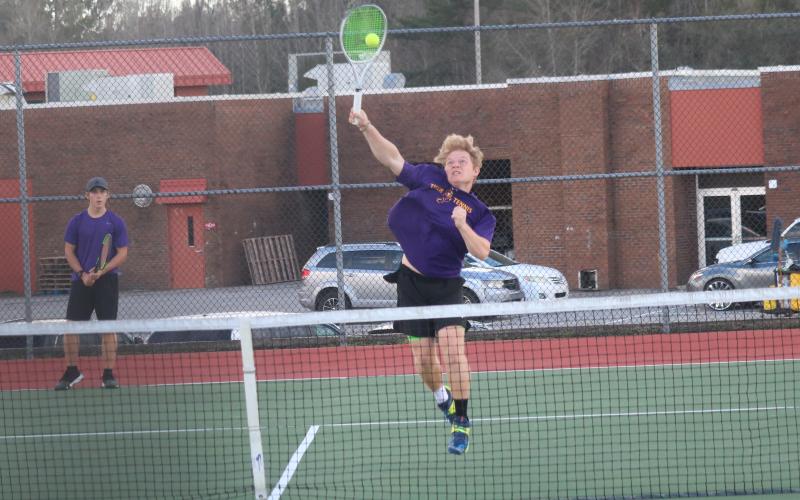 Columbia’s Camrin Wilcoxon returns a shot against Union County on Thursday. (JORDAN KROEGER/Lake City Reporter)