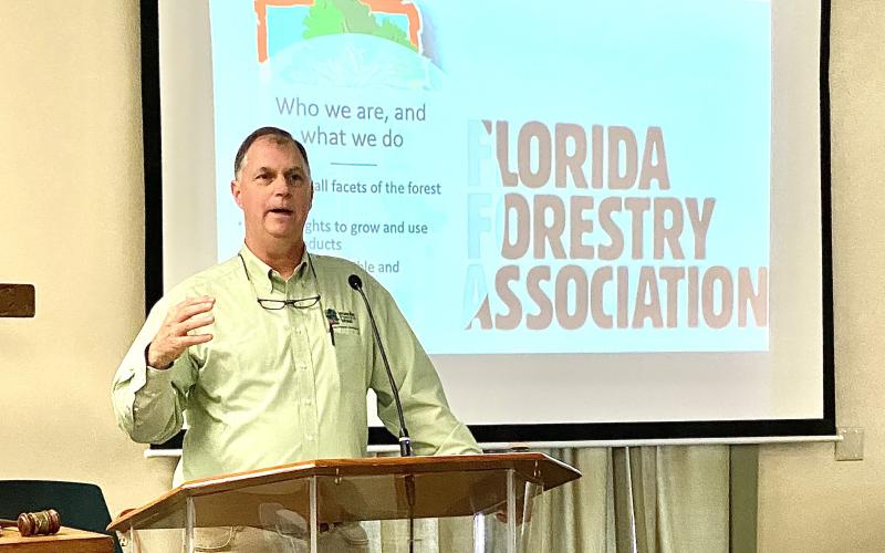 Alan Shelby, executive vice president of the Florida Forestry Association, speaks to the Rotary Club of Lake City during a presentation on Thursday. Shelby, and Lake City Rotarian and Florida Forestry Association President Carlton Jones, brought the program to the club. Forestry is a $100 million industry in Columbia County and the county has 700 forestry related jobs. (TODD WILSON/Lake City Reporter)