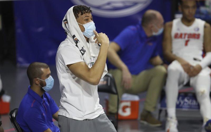 Florida's Keyontae Johnson is shown on the sidelines during the second half of a game on Jan. 19 in Gainesville. (MATT STAMEY/Associated Press)