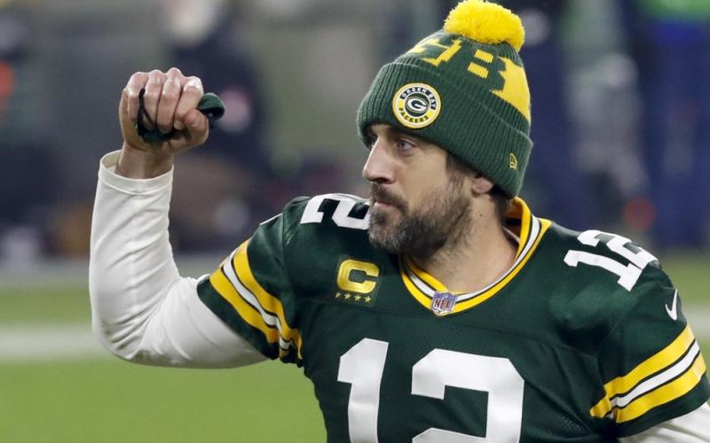 Green Bay Packers quarterback Aaron Rodgers pumps his fist after an NFL divisional playoff game against the Los Angeles Rams on Jan. 16 in Green Bay, Wis. (MIKE ROEMER/Associated Press)