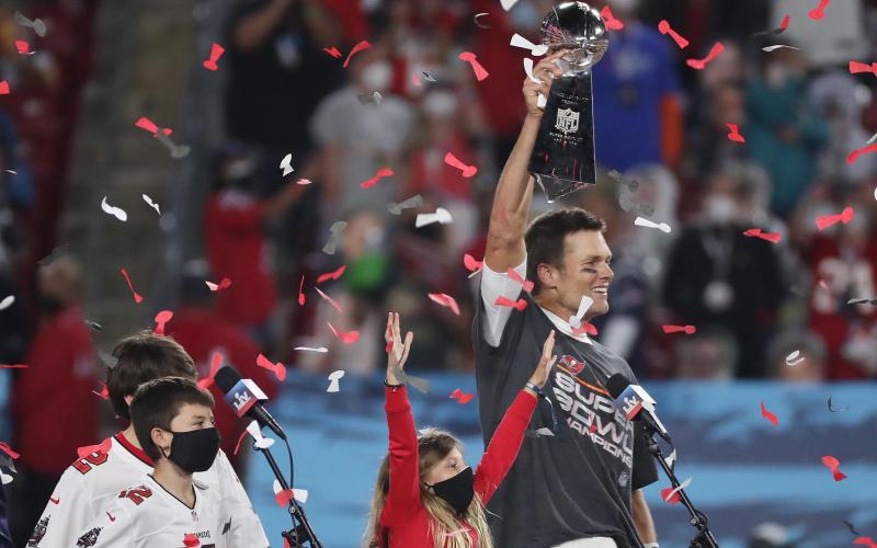 Tampa Bay Buccaneers quarterback Tom Brady celebrates after winning Super Bowl LV against the Kansas City Chiefs on Sunday at Raymond James Stadium in Tampa. (STEPHEN M. DOWELL/Orlando Sentinel/TNS)