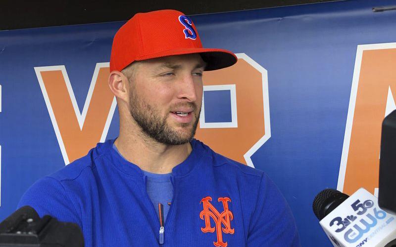 Syracuse Mets' Tim Tebow speaks with reporters prior to a minor league baseball game on may 16, 2019, in Syracuse, N.Y. Tebow had been invited to big league spring training by the New York Mets, taking one of 75 spots after Major League Baseball limited spring roster sizes as a coronavirus precaution. (AP FILE PHOTO)