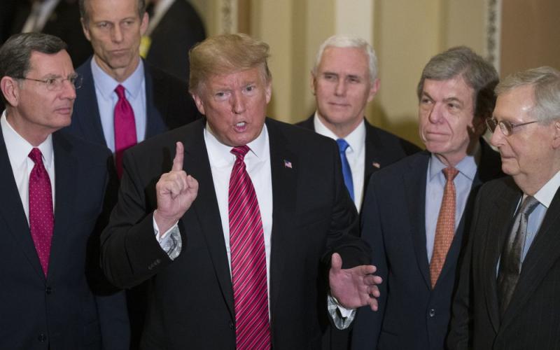Sen. John Barrasso, R-Wyo., left, and Sen. John Thune, R-S.D., stand with President Donald Trump, Vice President Mike Pence, Sen. Roy Blunt, R-Mo., and Senate Majority Leader Mitch McConnell of Ky., as Trump speaks while departing after a Senate Republican Policy luncheon, on Capitol Hill on Jan. 9, 2019, in Washington. The Senate acquitted Trump on Saturday of inciting the Jan. 6 attack on the U.S. Capitol. (AP FILE PHOTO)