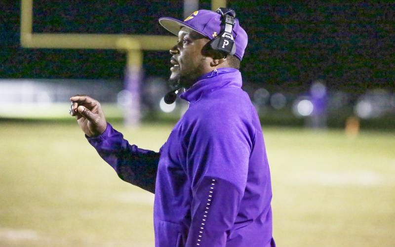 Columbia coach Brian Allen looks on during a game last season. (BRENT KUYKENDALL/Lake City Reporter)
