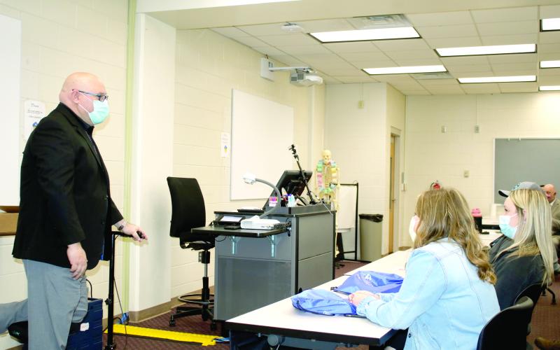 Lake City Medical Center CEO Rick Naegler talks to Florida Gateway College nursing students Wednesday during a nursing recruitment fair at the Barney E. McRae Jr. Medical Technology Building. (TONY BRITT/Lake City Reporter)