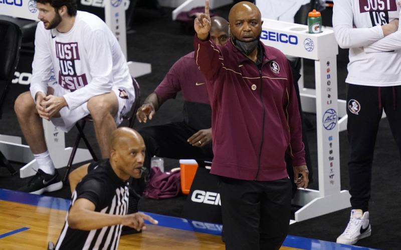 Florida State head coach Leonard Hamilton directs his team during the first half of a game against North Carolina in the semifinal round of the Atlantic Coast Conference Tournament on March 12 in Greensboro, N.C. (GERRY BROOME/Associated Press)