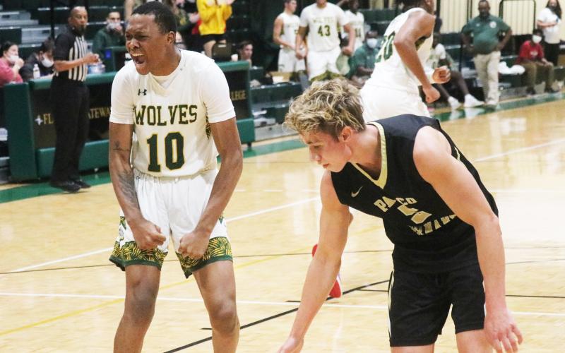 FGC forward D’Andre Jefferson yells in celebration after a dunk against Pasco-Hernando State College on Tuesday night. (JORDAN KROEGER/Lake City Reporter)