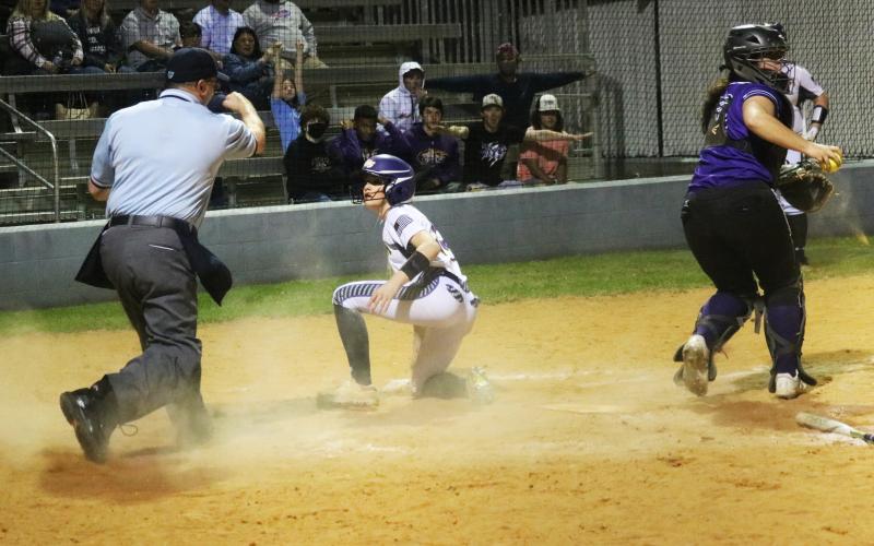 Columbia second baseman Anissa Penniman is called out at home plate during the first inning of Thursday's game against Gainesville. (JORDAN KROEGER/Lake City Reporter)
