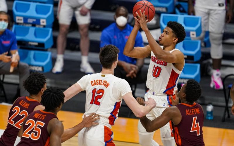 Florida guard Noah Locke (10) shoots against Virginia Tech in the first round game of the NCAA Tournament at Hinkle Fieldhouse on March 19 in Indianapolis. (MICHAEL CONROY/Associated Press)