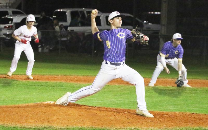 Columbia pitcher Truitt Todd hurls to the plate against Santa Fe during the fifth inning Friday night in Alachua. (MORGAM MCMULLEN/Lake City Reporter)