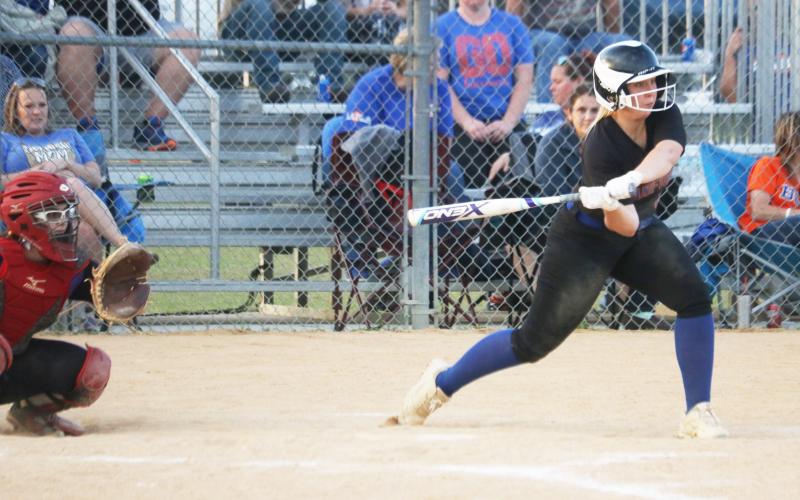 Branford’s Cera McElreath eyes a pitch against Columbia on Tuesday night. (MORGAN MCMULLEN/Lake City Reporter)