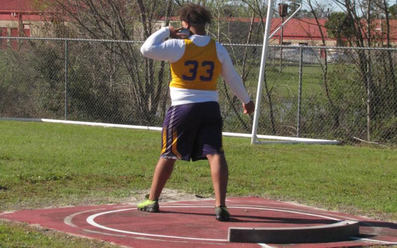 Columbia’s Nate Walmsley gets set to throw during the shot put at Tuesday’s Santa Fe mini meet. (COURTESY)