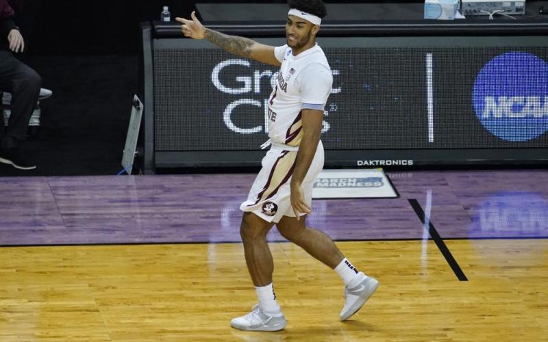 Florida State guard Anthony Polite (2) celebrates a 3-pointer against Colorado during a second-round game in the NCAA Tournament at Farmers Coliseum on March 22 in Indianapolis. (CHARLES REX ARBOGAST/Associated Press)