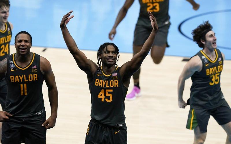 Baylor guard Davion Mitchell (45) celebrates at the end of the championship game against Gonzaga in the men's Final Four in the NCAA Tournament at Lucas Oil Stadium on Monday in Indianapolis. Baylor won 86-70. (DARRON CUMMINGS/Associated Press)