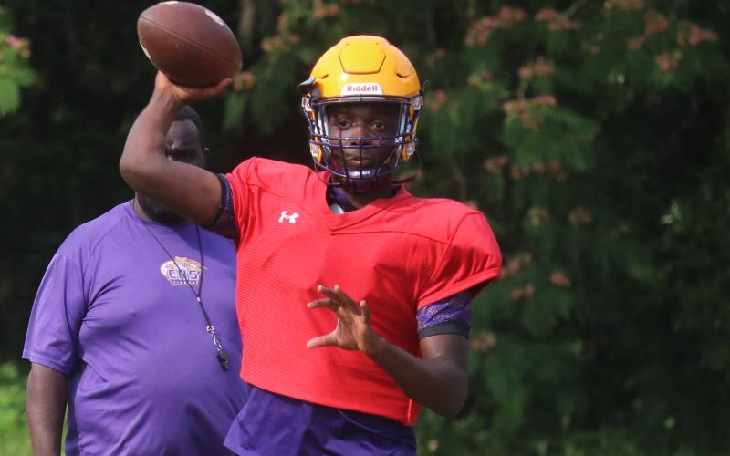 Columbia quarterback Brae Deal throws a pass during Friday's practice. (JORDAN KROEGER/Lake City Reporter)