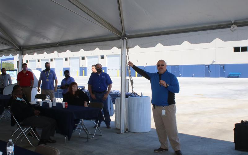 Jason Easom, Werner terminal manager in Lake City, introduces Derek Leathers, Werner president and CEO, during the company’s Spring Driver Appreciation Week activities Monday morning. (TONY BRITT/Lake City Reporter)