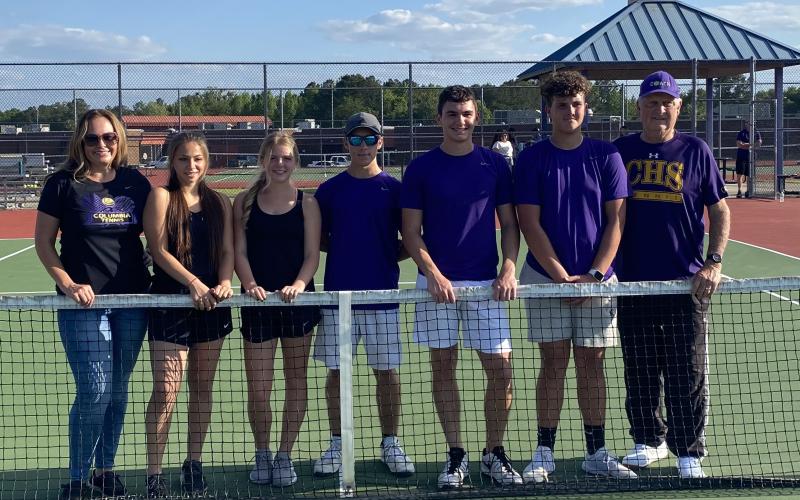 Columbia’s tennis team celebrated Senior Day on Tuesday against Suwannee. Pictured are girls coach Brandi O’Neal (from left), Taiya Driggers, McKenna Thomas, Caleb Stengel, Cole Wehrli, RJ Dutch and boys coach Tom Moore. See the prep roundup above for full results from the day. (COURTESY)