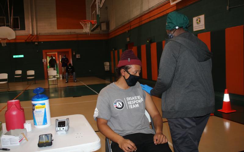 Alejandro Lara prepares to get a Johnson &amp; Johnson covid-19 vaccination Wednesday afternoon while at the Richardson Community Center. (TONY BRITT/Lake City Reporter)