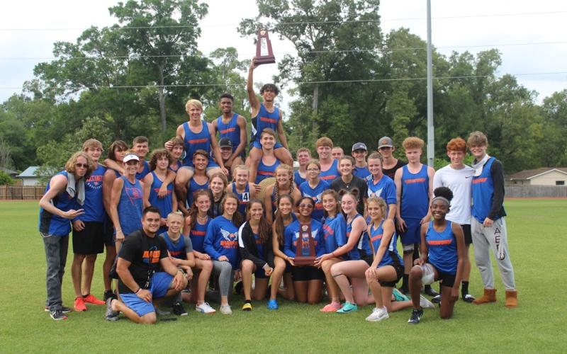 Branford’s boys and girls track and field teams are pictured after Saturday’s District 5-1A meet. The boys won their first title since 2009, while the girls finished runner-up. (COURTESY)