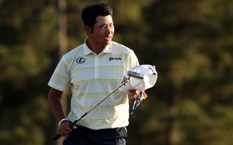 Hideki Matsuyama celebrates on the 18th green after winning the Masters at Augusta National Golf Club on Sunday in Augusta, Ga. (KEVIN C. COX/Getty Images/TNS)