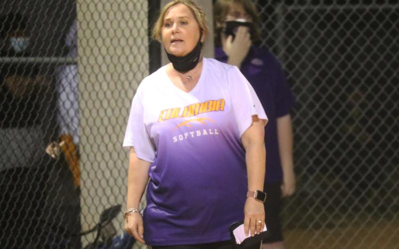 Columbia softball coach Trudy Andrews gives instructions to a batter during a game this past season. (JORDAN KROEGER/Lake City Reporter)