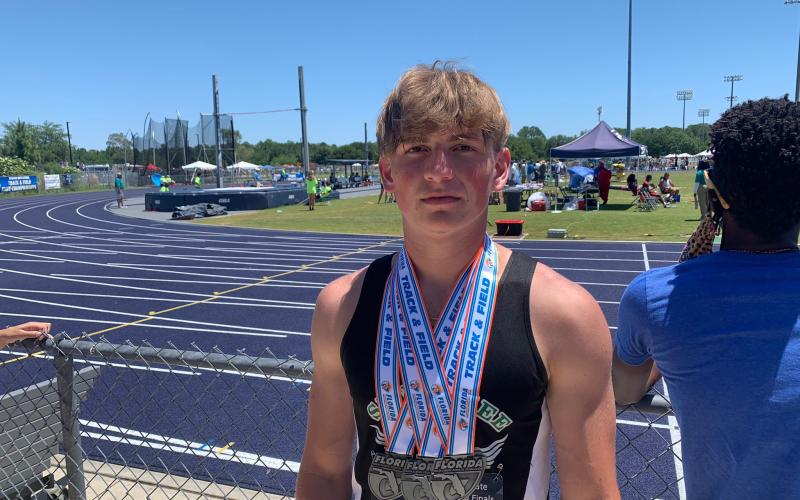 Suwannee track &amp; field athlete Garrison Beach is pictured with his three medals from the Class 2A state meet on Saturday after placing fifth in the javelin, sixth in the 300 hurdles and eighth in the 110 hurdles. (COURTESY)