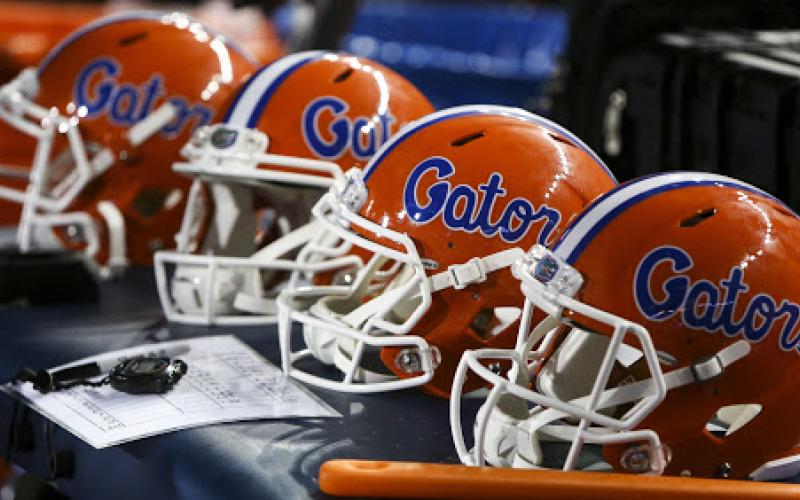 Florida Gators helmets sit on a table during the game against the Charleston Southern on Sept. 1, 2018 at Ben Hill Griffin Stadium in Gainesville. (TRIBUNE NEWS SERVICE)