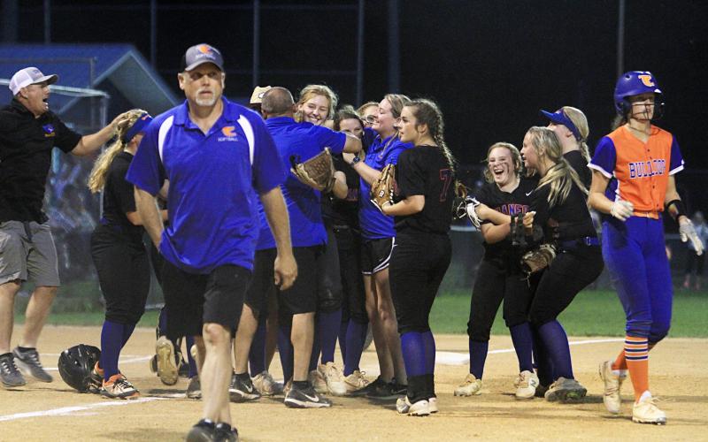 Branford's softball team celebrates winning the Region 3-1A championship after defeating Taylor County 14-3 in five innings on Tuesday night. (PAUL BUCHANAN/Special to the Reporter)