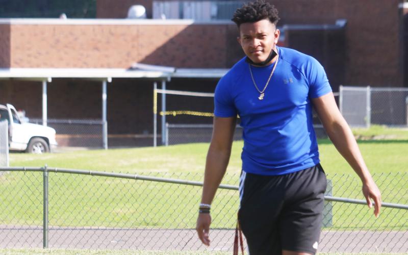 Columbia running back Jaelin Brown watches practice from the sideline last week. Brown is recovering from a torn ACL suffered at the end of last season. (JORDAN KROEGER/Lake City Reporter)