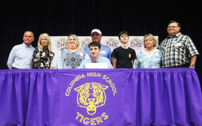 Columbia outfielder/catcher Bryant Green is pictured with his family after signing his letter of intent with Trinity Baptist College on Thursday afternoon. (JORDAN KROEGER/Lake City Reporter)