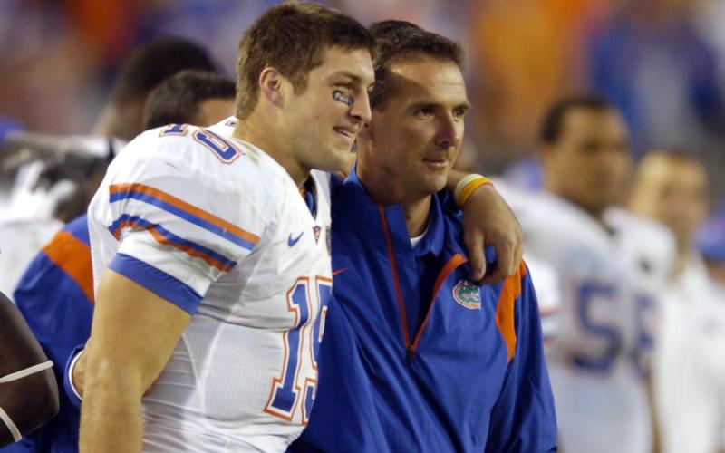 Former Florida quarterback Tim Tebow, left, and former Florida coach Urban Meyer celebrate in the fourth quarter during a college football game against Georgia on Nov. 1, 2008, in Jacksonville. Tebow and Meyer are together again, this time in the NFL and with Tebow playing a new position. The former Florida star and 2007 Heisman Trophy-winning quarterback signed a one-year contract with the Jacksonville Jaguars on Thursday and will attempt to revive his pro career as a tight end. (AP FILE PHOTO)
