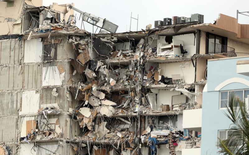 The 12-story oceanfront Champlain Towers South Condo in Surfside is shown on Friday. A large portion of the building collapsed very early Thursday morning. (AMY BETH BENNETT/South Florida Sun-Sentinel/TNS)