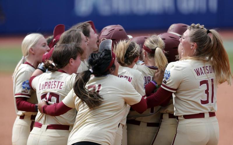 Florida State players celebrates after defeating Arizona in Saturday’s Women's College World Series game in Oklahoma City. (ALONZO ADAMS/Associated Press)