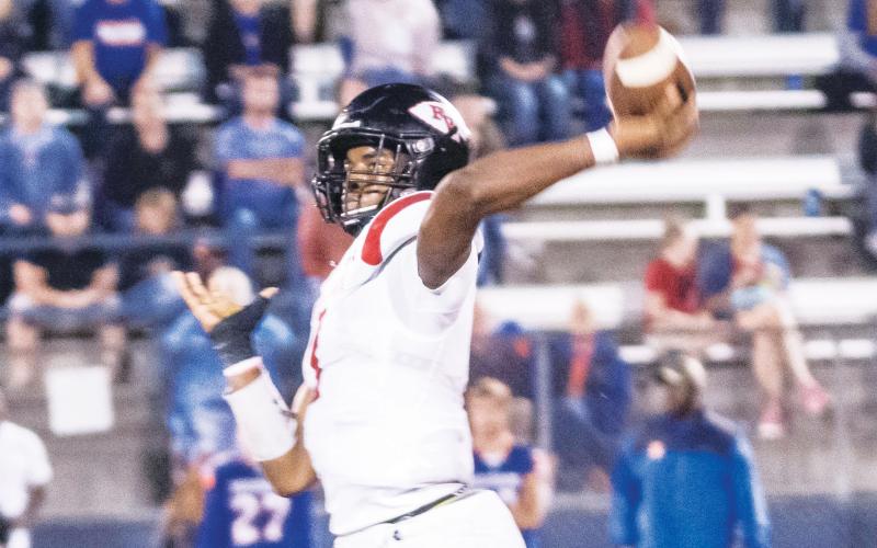 Fort White quarterback Tyler Jefferson throws a pass against Branford during last season’s Region 3-1A quarterfinals. Jefferson transferred to Hawthorne following spring practice for his junior season. (FILE)