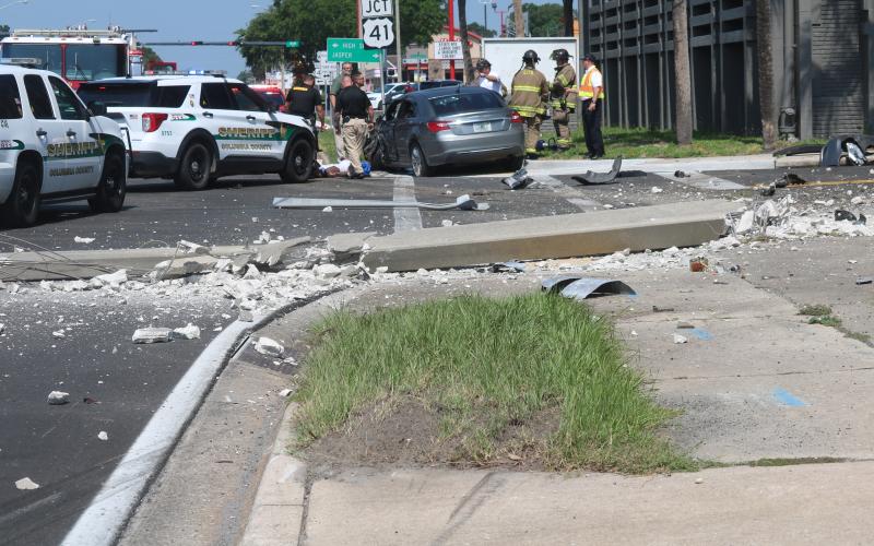 A Chrysler sedan led law enforcement officers on a chase topping 100 mph just before 11 a.m. Tuesday morning. The driver, 32-year-old Tyrece Roundtree, smashed into the side of a medical services van before crashing to a stop at the intersection of U.S. Highway 90 and N. Marion Ave. (JAMIE WACHTER/Lake City Reporter)